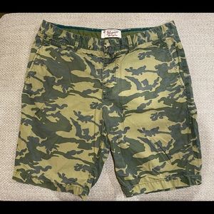 Green camo shorts by Penguin company